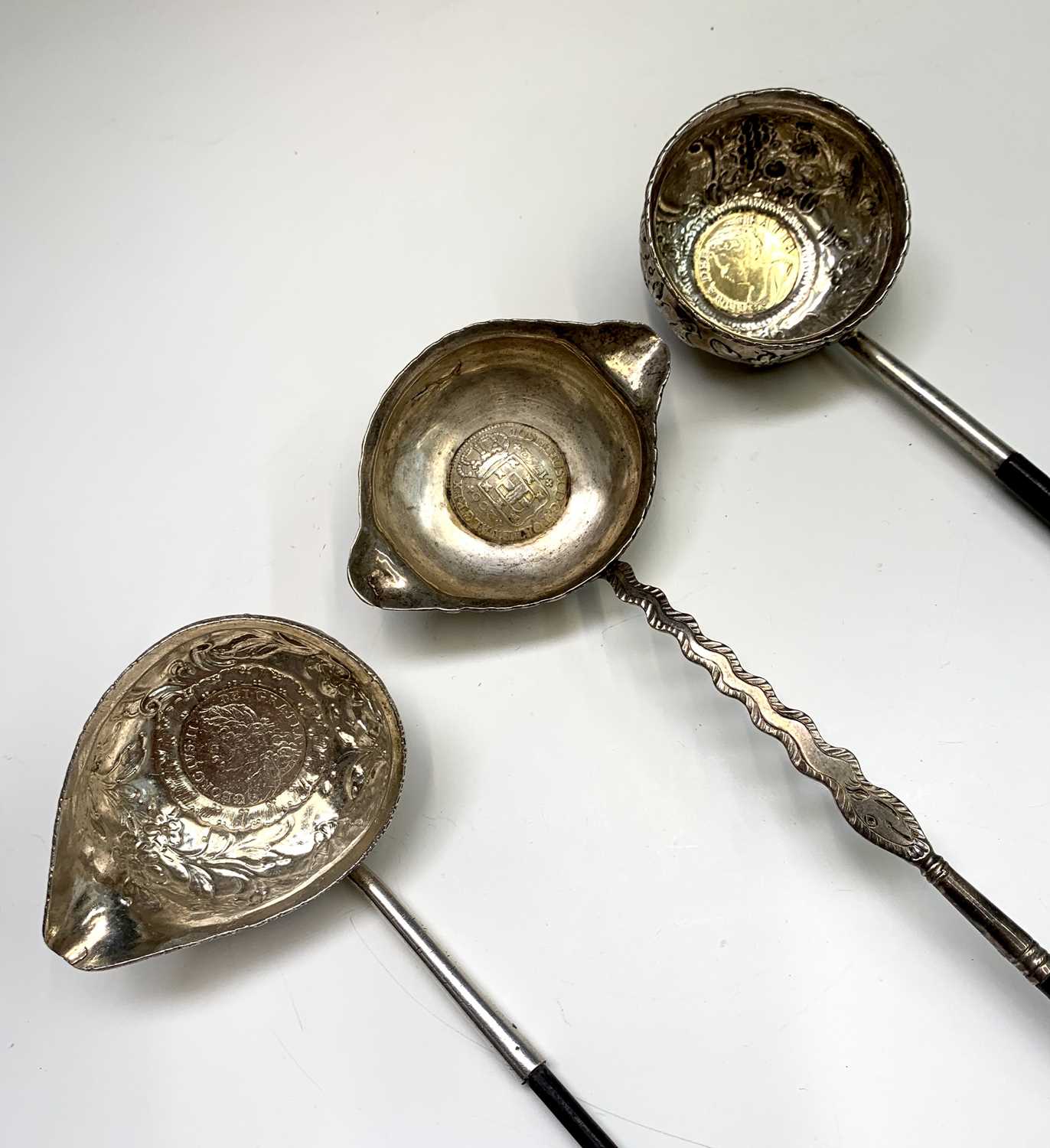 Three coin set 18th century punch ladles, with spiral whale bone handles, one set a George II - Bild 3 aus 3