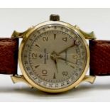 A gentleman's automatic watch with spurious makers name in gold plated case with sweep seconds and
