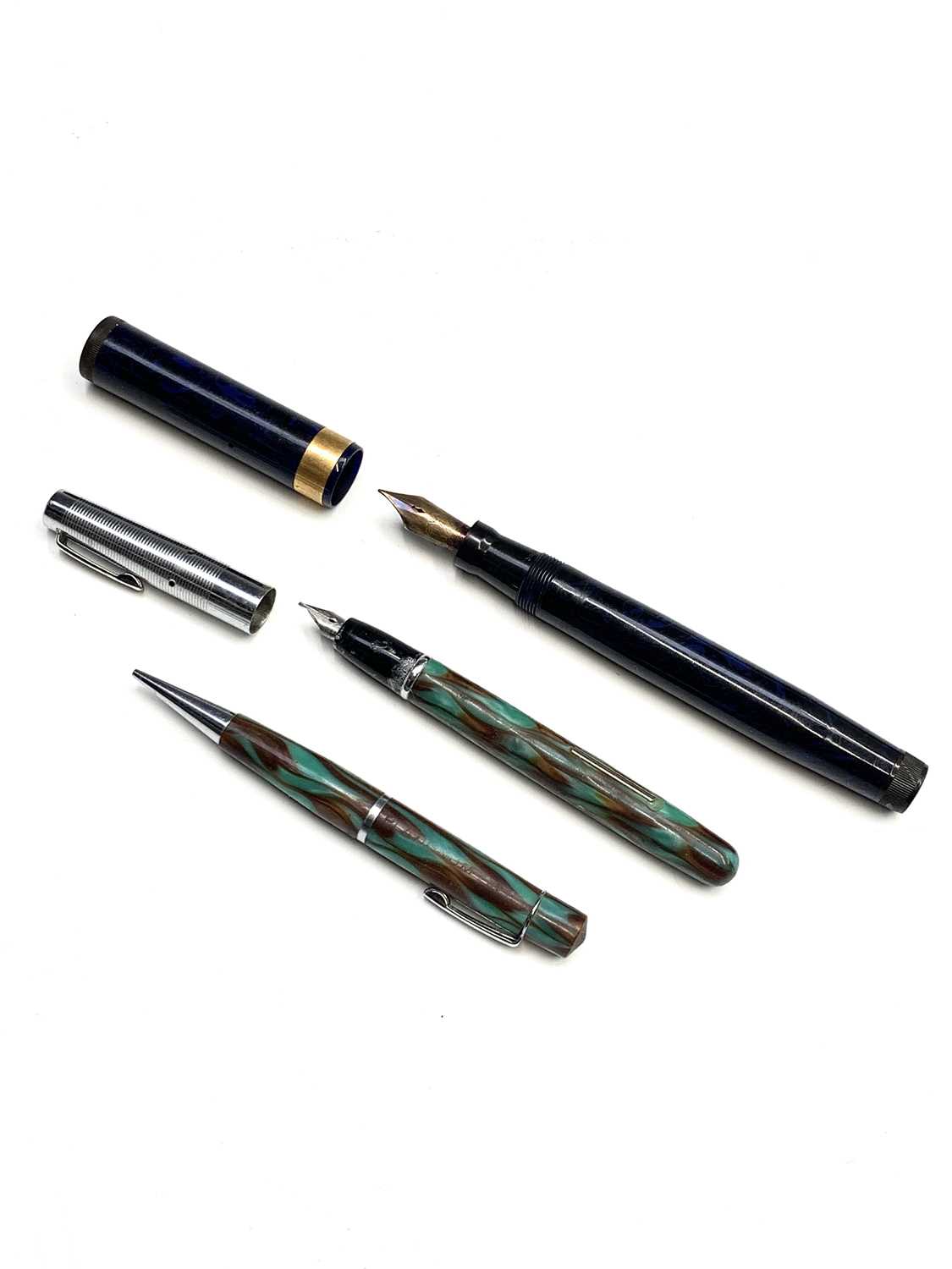 A Swan Mabie Todd L 470/52 Blue/Black,Marble Leverless fountain pen with size 4 14ct gold nib. The