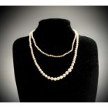 A cultured pearl 83cm necklace the largest 7.24mm