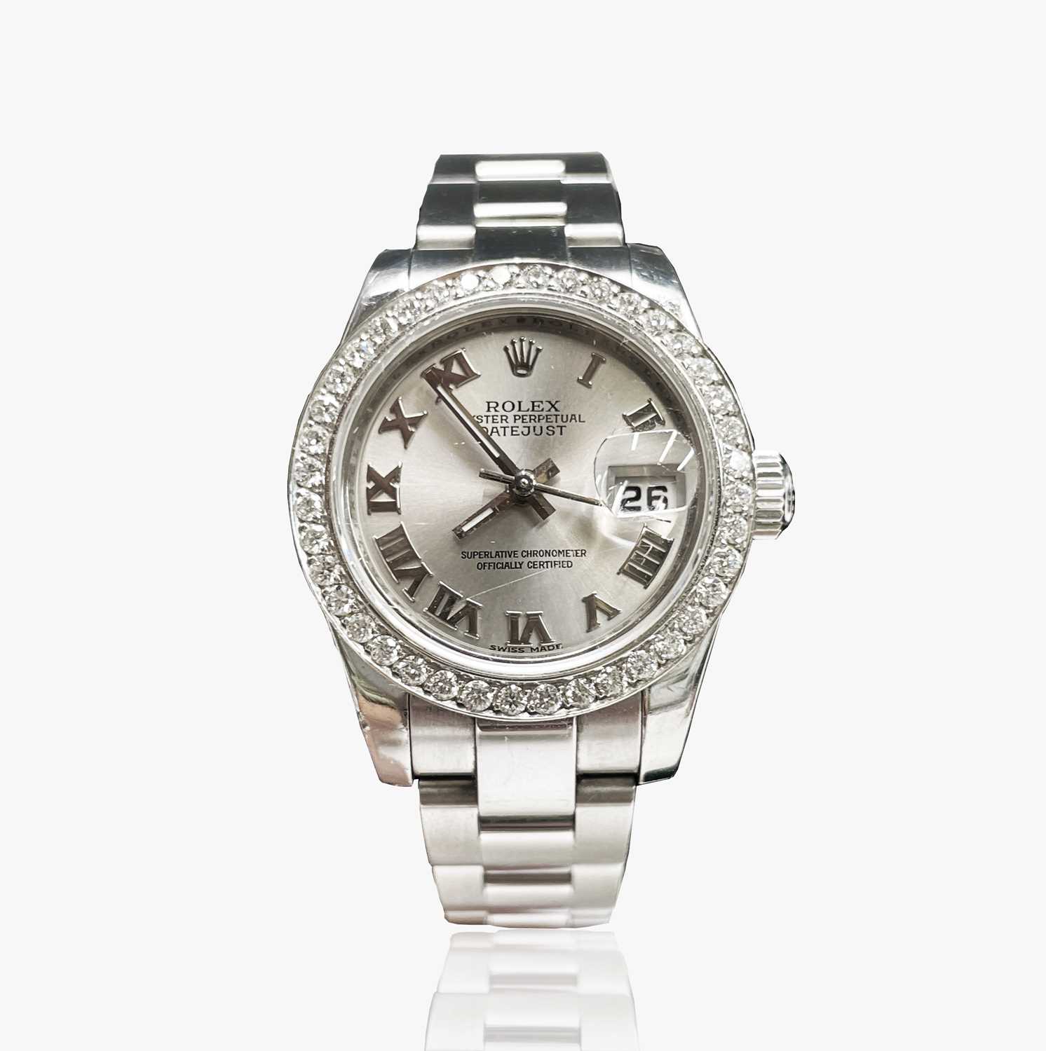 A Rolex ladies Oyster Perpetual Datejust Superlative Chronometer with diamond bezel, diameter 26.