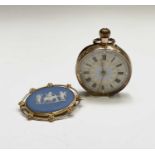 A 14ct gold cased keyless fob watch and a 9ct gold mounted Wedgwood cameo brooch 4.4gmCondition