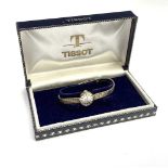 A ladies 9ct gold Tissot wristwatch on 9ct gold bracelet 16.2gmCondition report: This manual watch