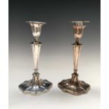 A pair of Victorian Adam style filled silver candlesticks by Hawksworth, Eyre & Co Ltd with