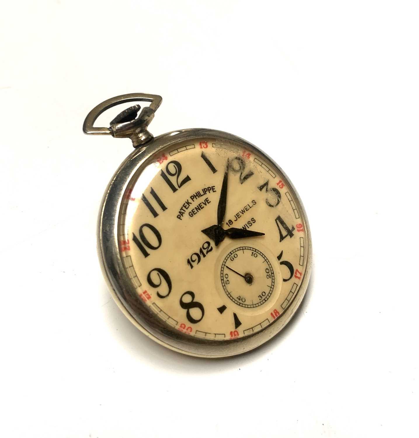A keyless pocket watch inscribed 'Patek Philippe Geneve'.Condition report: Doesn't work