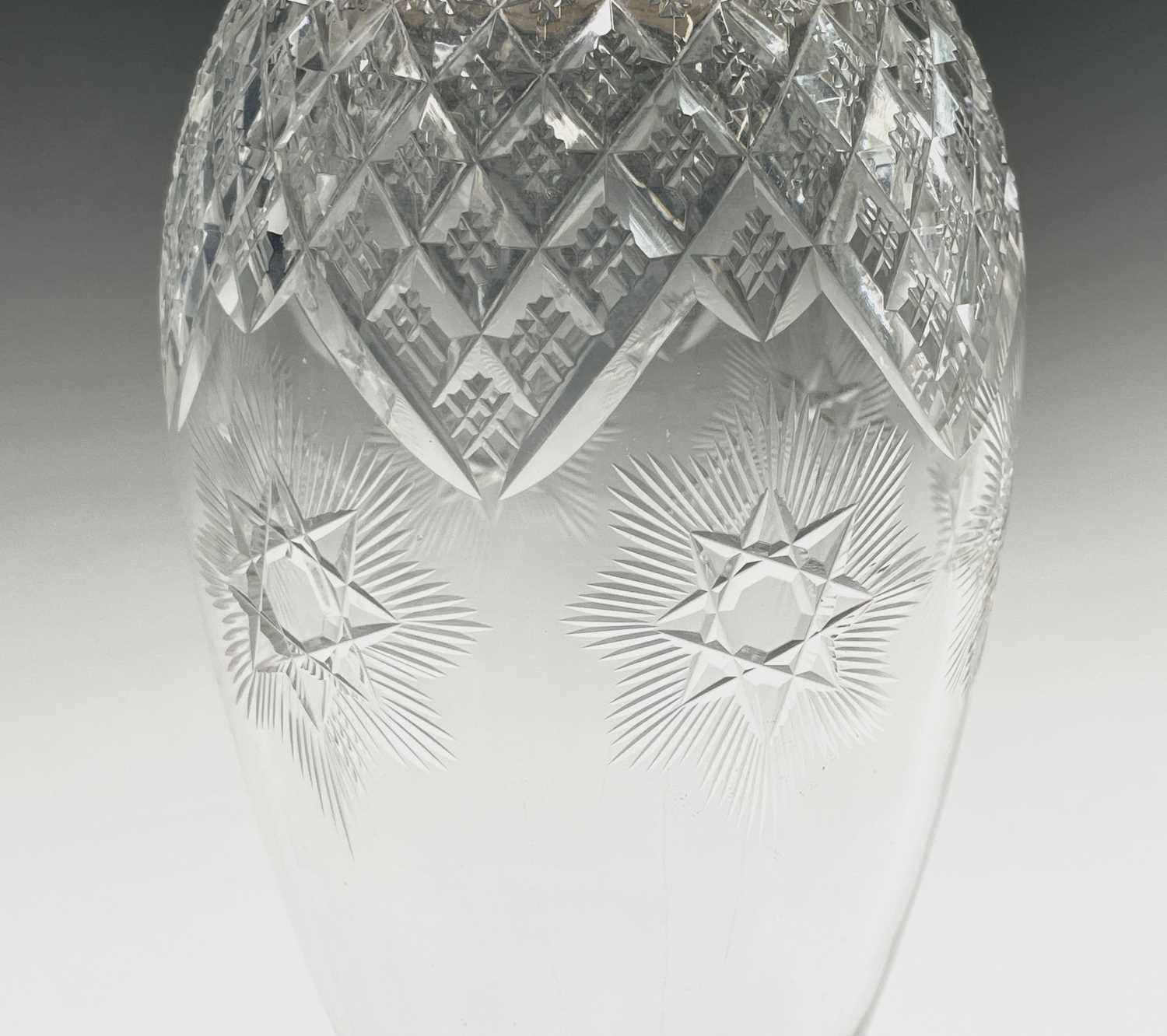 A good cut glass ovoid footed decanter with plain silver shoulder neck and quatrefoil rim by James - Image 2 of 8