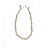 A 41cm string of 46 well-matched 7.5mm pearls Gold clasp and white gold safety chain with clasp