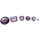 Six faceted unmounted amethystCondition report: Sizes 27ct(large chip), 18ct (small chip), 10.5ct,