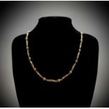 A 9ct gold fancy link 58cm chain 15.9gm