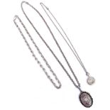 A Victorian aesthetic movement silver locket on silver belcher link 60cm chain, a modern silver 50cm