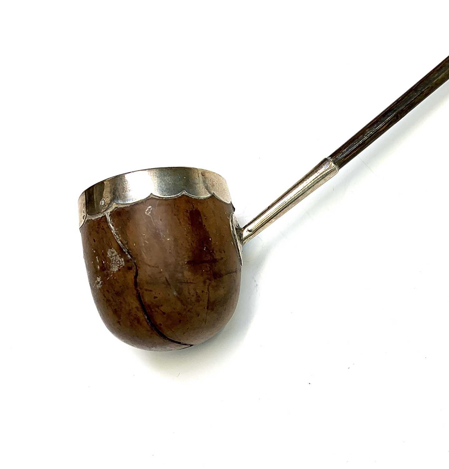 A Georgian punch ladle with spiral whale bone handle, the bowl a silver mounted wooden nut. - Bild 2 aus 3