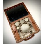 Asprey London ostrich leather gentleman's vanity case, with nine engine-turned silver-mounted