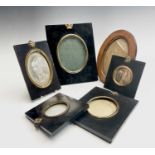 Ebonised frames for portrait miniatures.Five frames, round and oval, plus one other in lighter wood.