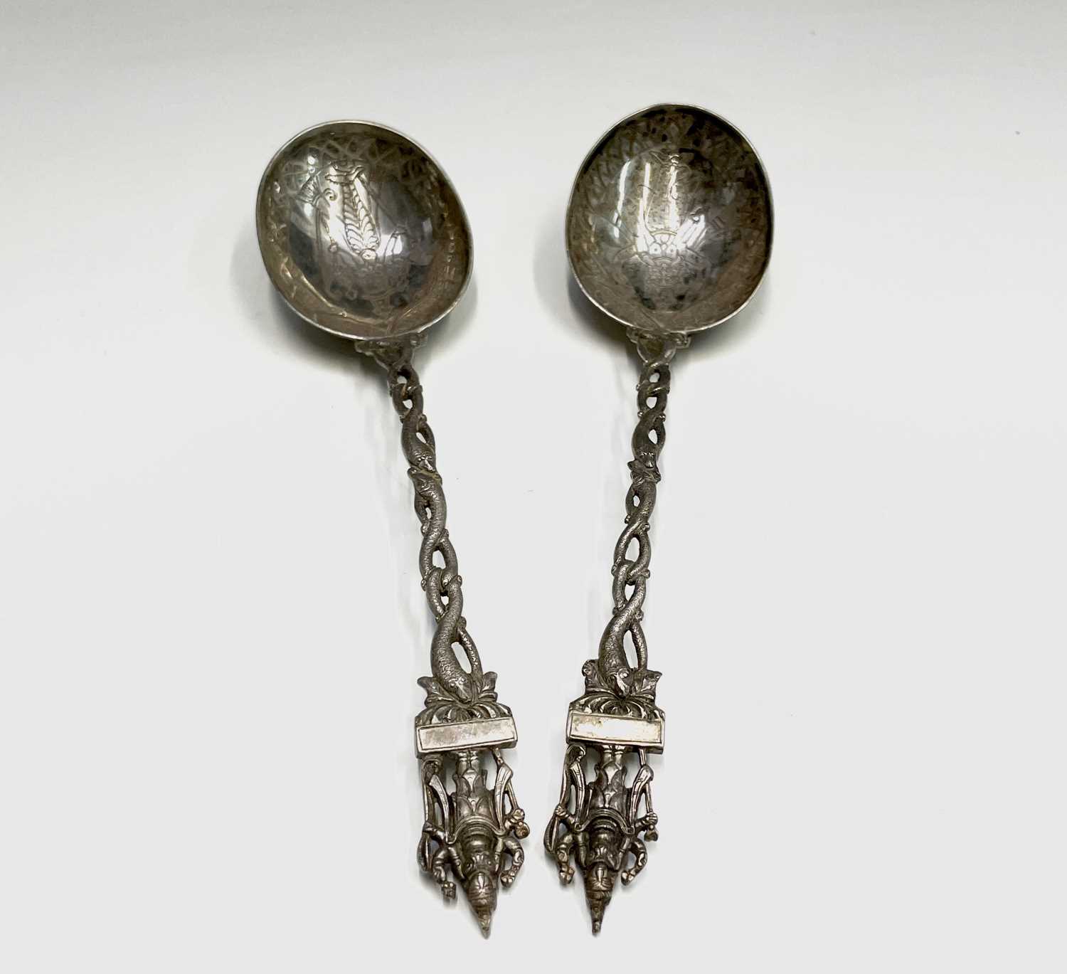 A pair of Indian silver deity spoons 21cm 139.3gmCondition report: No condition issues