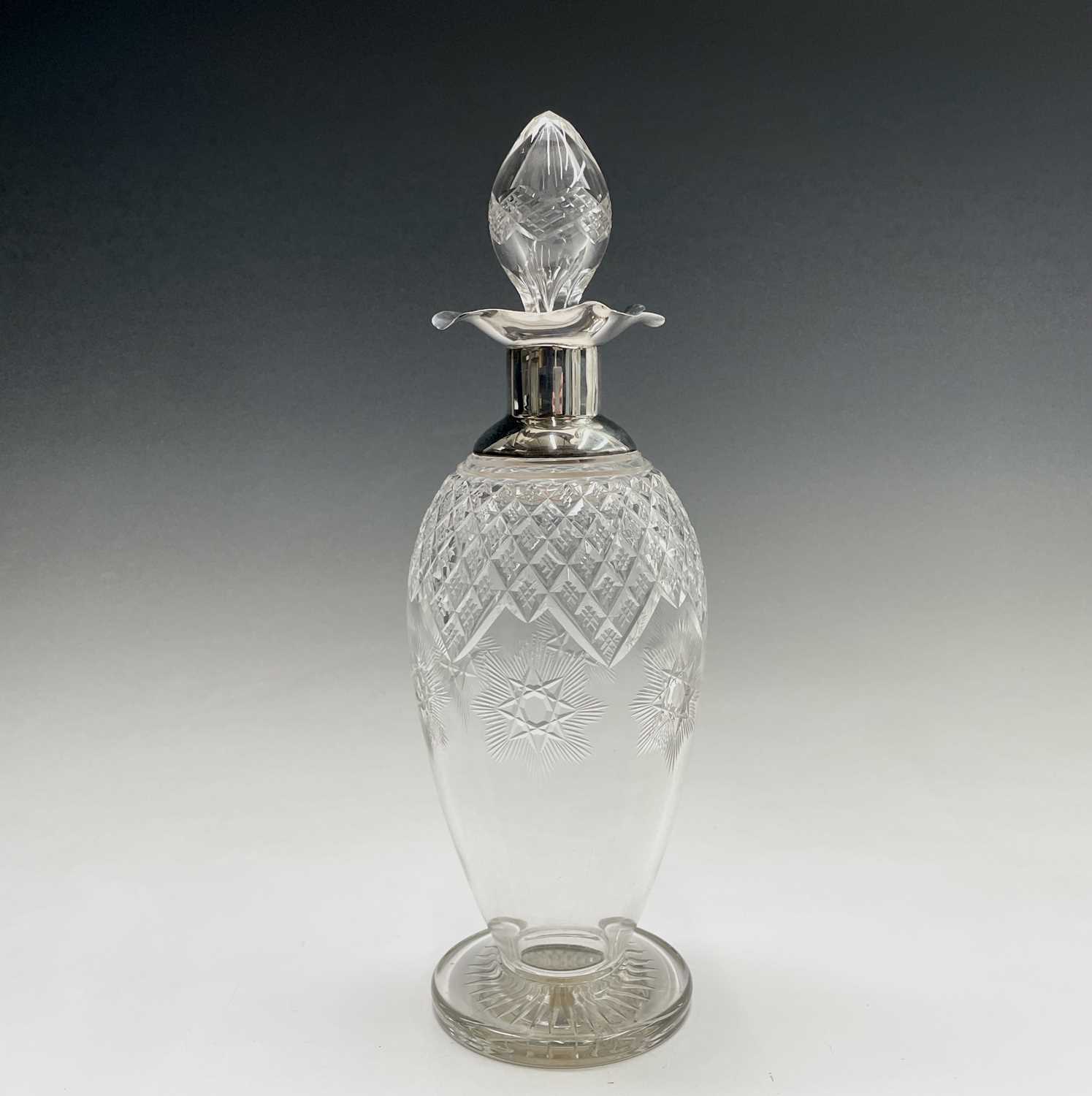A good cut glass ovoid footed decanter with plain silver shoulder neck and quatrefoil rim by James - Image 8 of 8