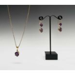 A pair of 9ct gold amethyst set earrings together with a gold-mounted amethyst drop pendant and