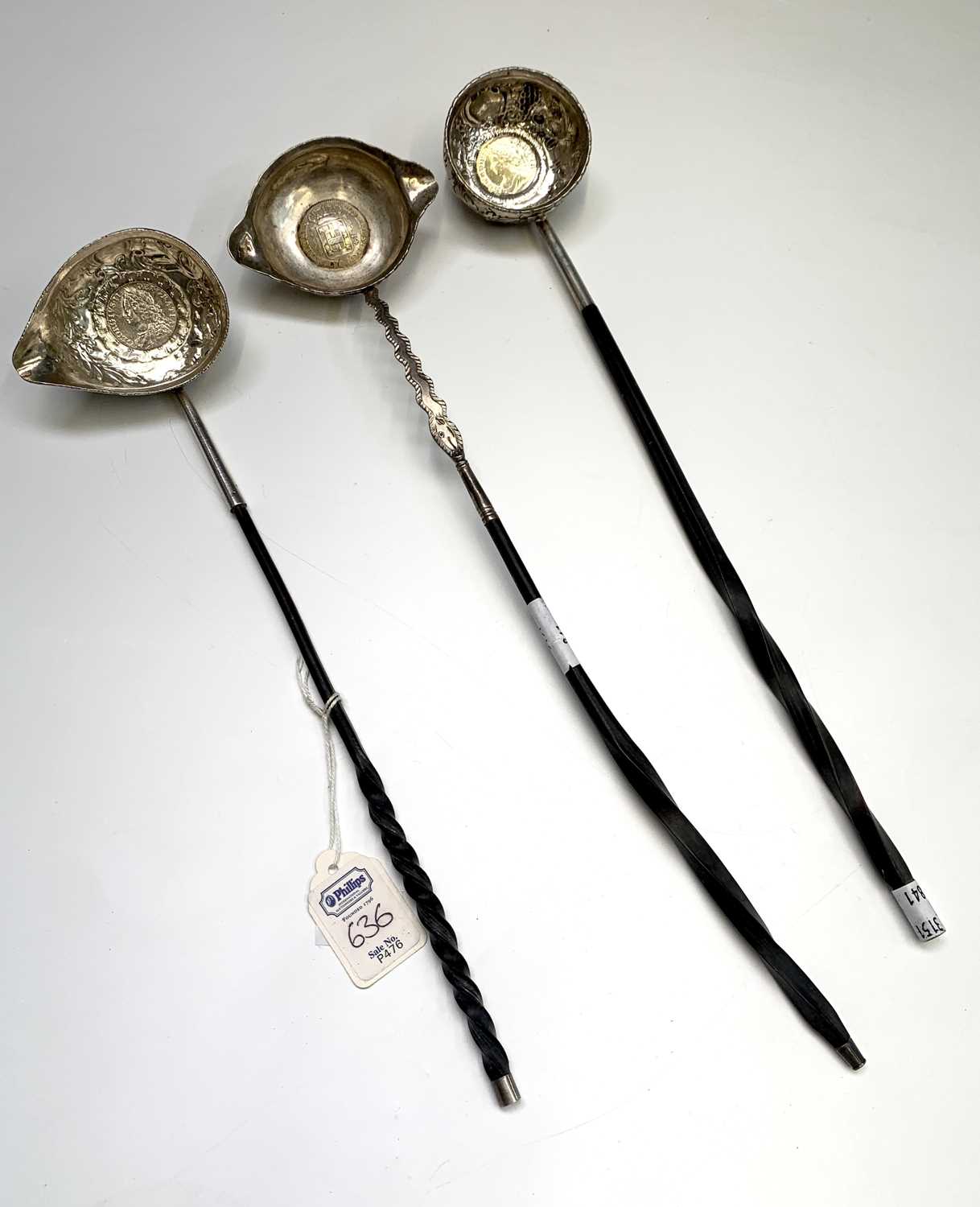 Three coin set 18th century punch ladles, with spiral whale bone handles, one set a George II