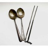 A pair of Chinese silver presentation spoons 17.8cm 55.9gm and a pair of Chinese silver chopsticks