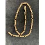 A 15ct gold watch chain with bow-shaped links 38cm 23.3gmCondition report: Good used condition but
