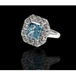An important and exceptional Fancy Vivid Blue VVS2 diamond of 3.02cts set with 1.25cts of white