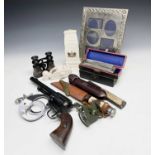 A set of Hiatt handcuffs, dated 1960, with key, and a box of other items including a replica pistol,