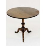 A George III mahogany circular occasional table, with tilt top on a turned pillar and tripod base,