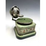 A German Nirona child's gramophone, "888", with green enamelled and transfer decoration, width