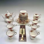 A Royal Albert 'Old Country Roses' tea set comprising tea pot, milk jug, sugar bowl, four teacups,
