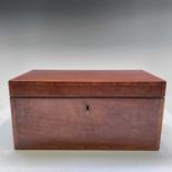 A George III mahogany and rosewood banded rectangular tea caddy, with satinwood and banded interior,