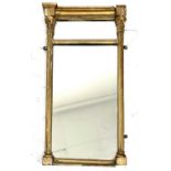 An early 19th century gilt pier glass, with divided plate and column side pieces, height 68cm, width