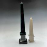 A 20th century polished black slate and malachite obelisk, height 60cm, together with a marble