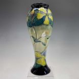 A Moorcroft 'Hypericum' pattern vase, designed by Rachel Bishop, painted and impressed marks to base
