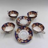 A Royal Albert 'Heirloom' pattern tea set comprising six teacups and six saucers.