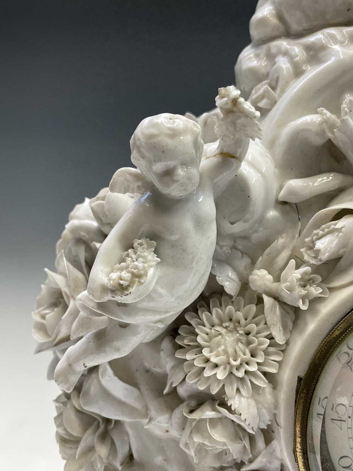 A 19th century French porcelain cased mantel clock by Vion & Baury, surmounted by a shepherdess, - Image 10 of 13