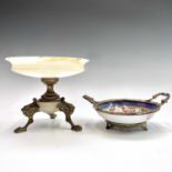 A 19th century marble and bronze tazza, the tripod supports with lion's mask terminals and paw feet,