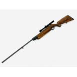 A Weihrauch HW 35 5.5 Kal air rifle, with walnut stock, serial number 844835, total length 121cm,