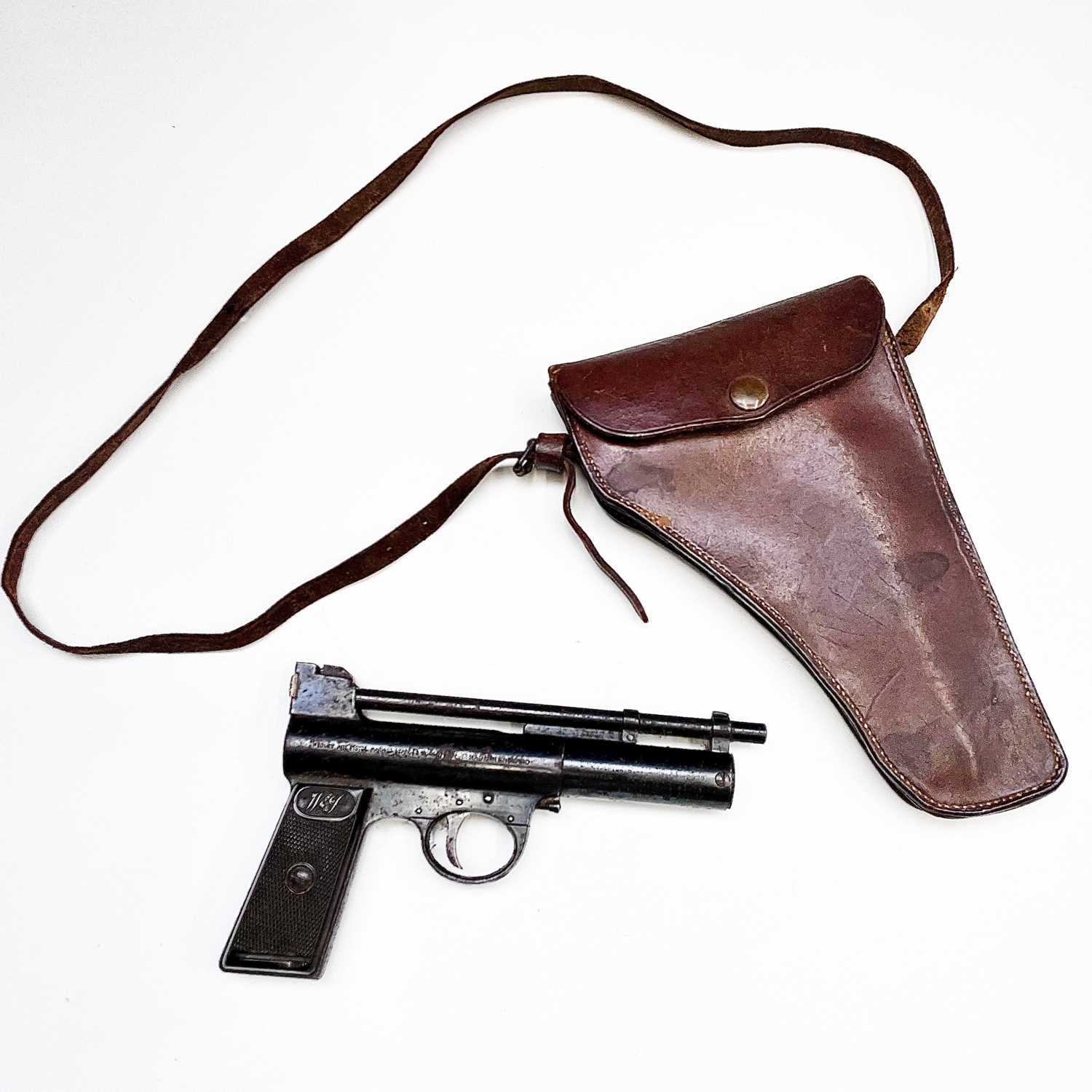 A Webley & Scott Mark II target air pistol, serial number 26404, also stamped 404, the blued steel