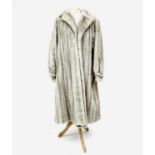 A ladies full-length silver fox fur coat, with belt. Approximate size 16.Condition report: Very good