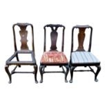 A George II walnut dining chair with vase shaped splat, and cabriole front legs with turned square