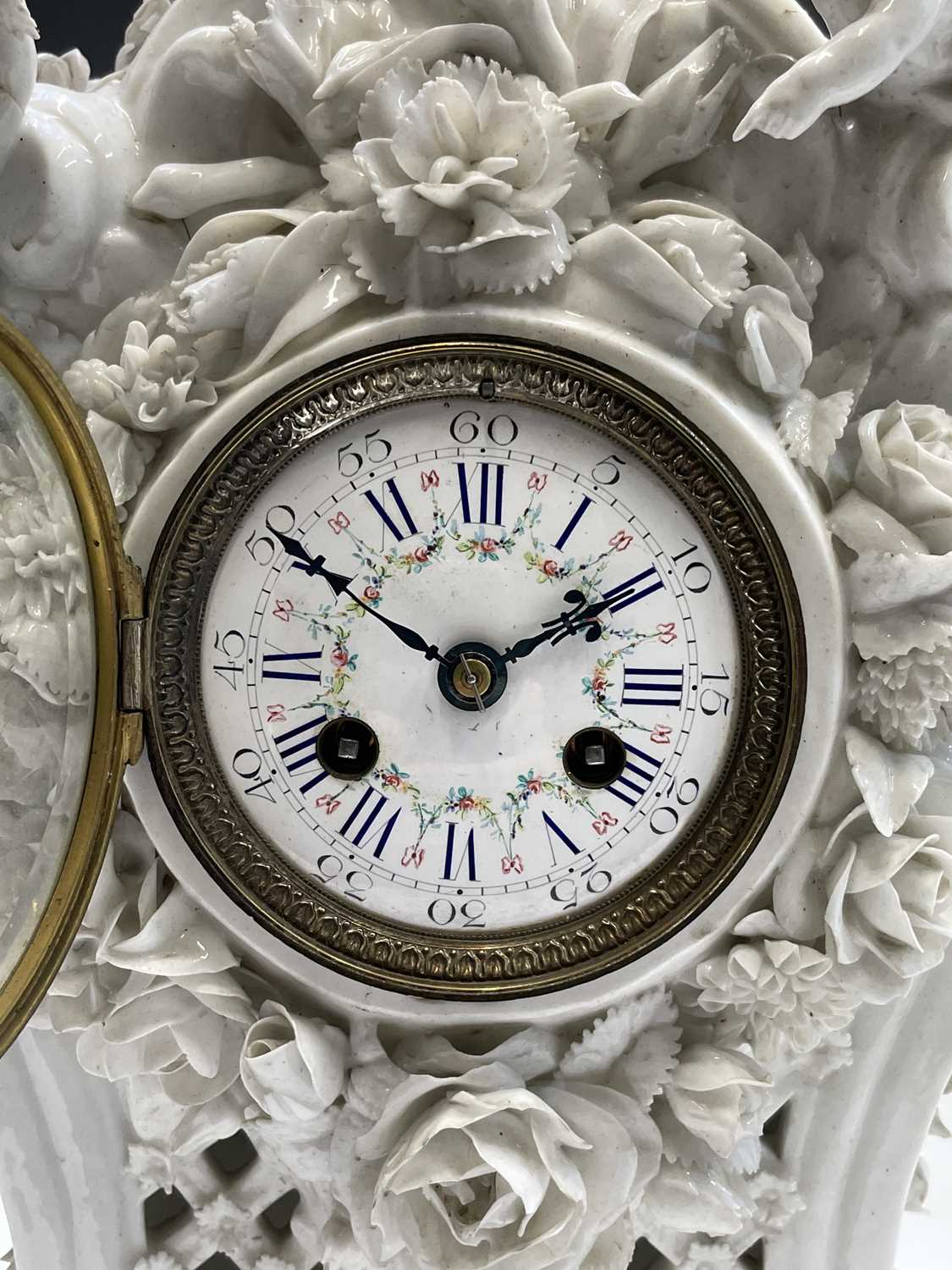 A 19th century French porcelain cased mantel clock by Vion & Baury, surmounted by a shepherdess, - Image 12 of 13