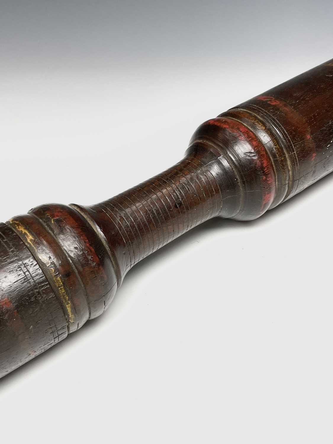 A turned heavy hardwood baton, 19th century, possibly a fighting weapon, with painted bands and - Image 2 of 4