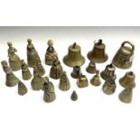 A collection of 23 19th century and later brass bells including 14 different lady bells, various