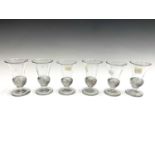 A set of six 19th century jelly glasses, the trumpet bowls with wrythen knopped bases, height 9.6cm.