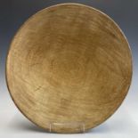 A large turned wood bowl, diameter 54cm.