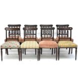 A matched set of eight Regency mahogany bar back dining chairs with moulded oval triple splats, on