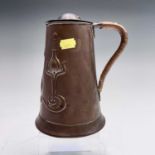 An Arts and Crafts copper lidded jug, by Joseph Sankey & Son, of tapered form, embossed with