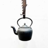 A Victorian cast iron kettle, height 28cm, together with an adjustable chimney crane (2).