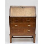 A Heal's oak bureau, with slope front above two short and two long drawers, on square legs, one