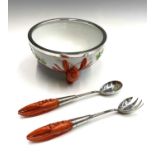 A continental 'lobster' design ceramic salad bowl with silver plated rim, together with a pair of