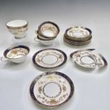 A Minton 'Dynasty' pattern part tea service comprising five cups, five saucers, six side plates